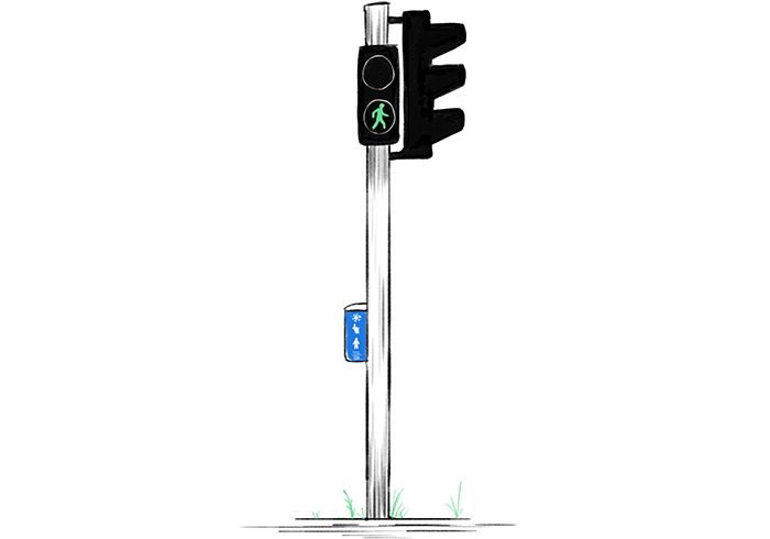 Green walking signal at pedestrian crossing light