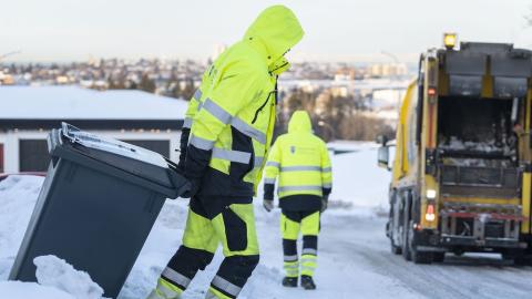 Staff working on waste collection during winter.